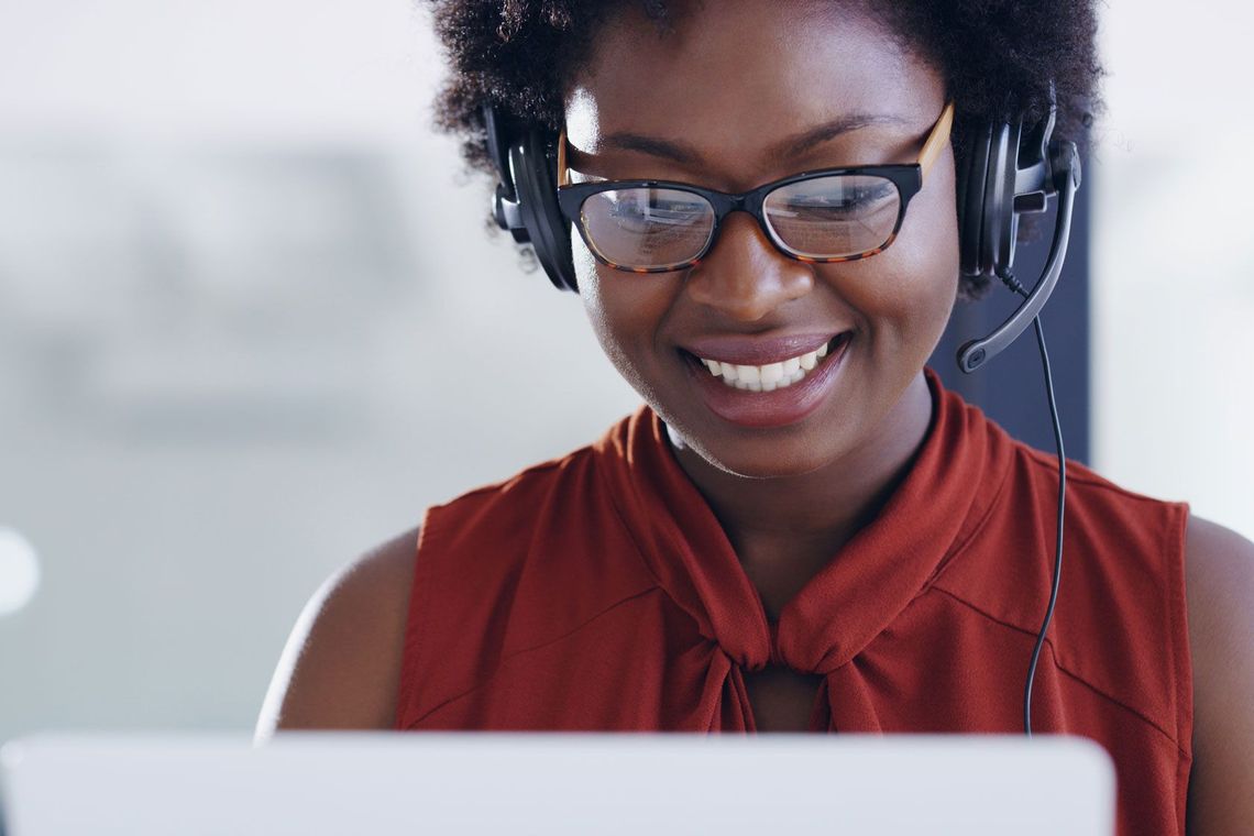Woman happy talking on bluetooth